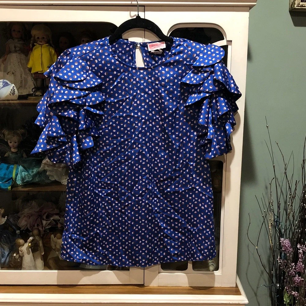 Authentic kate spade NWOT Blue top with design